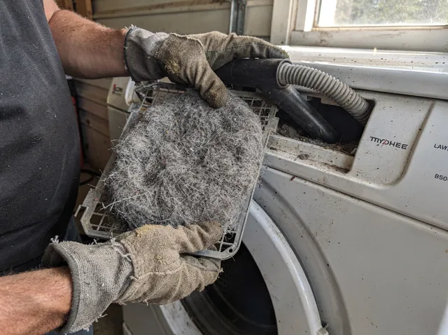 Cleaning Dryer Lint Trap in Oxford